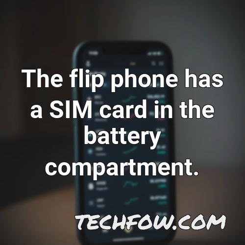 the flip phone has a sim card in the battery compartment